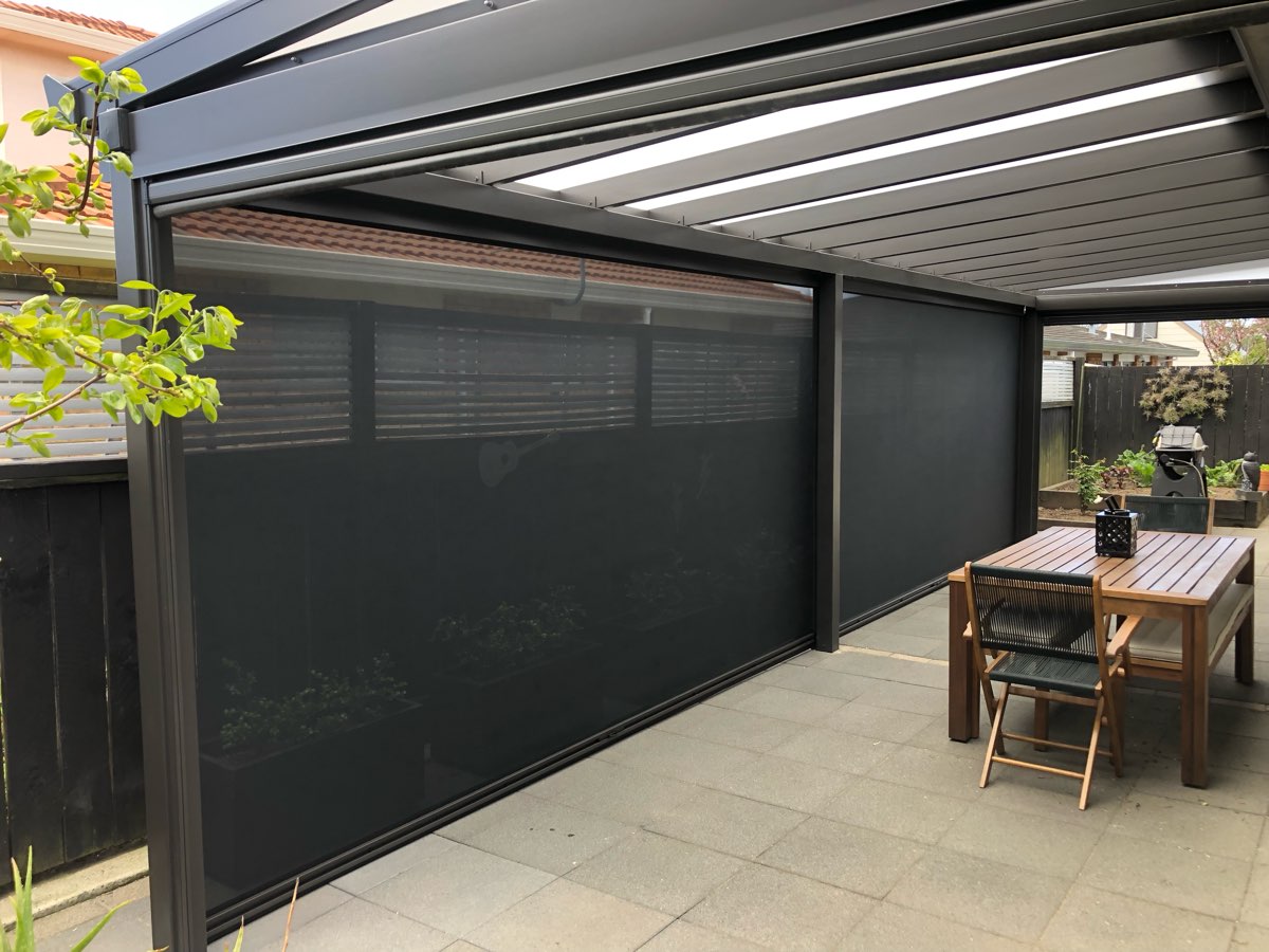 Modern home exterior with outdoor blind system
